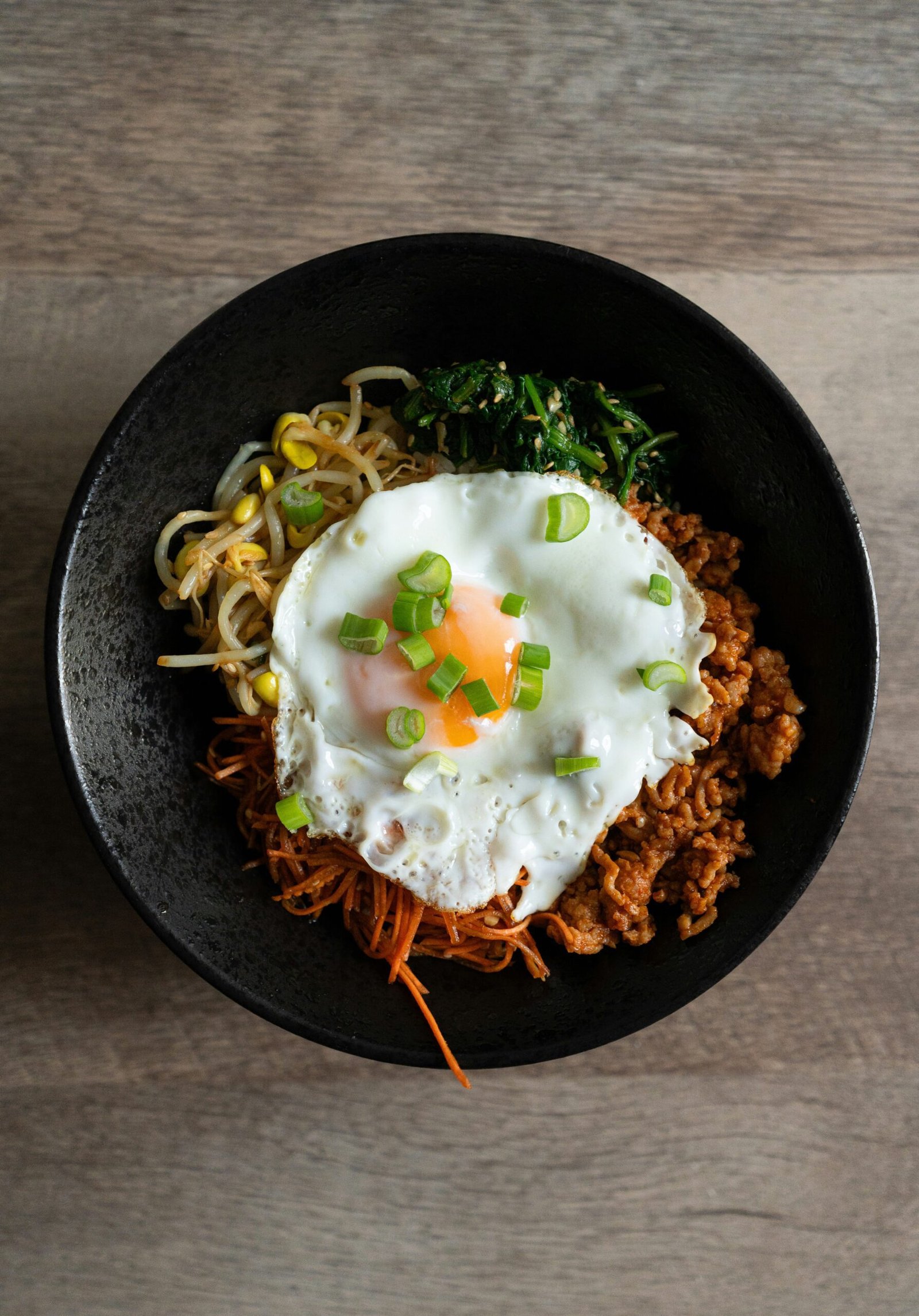 What Are Some Traditional Korean Dishes That Showcase The Use Of Mung Bean Sprouts?